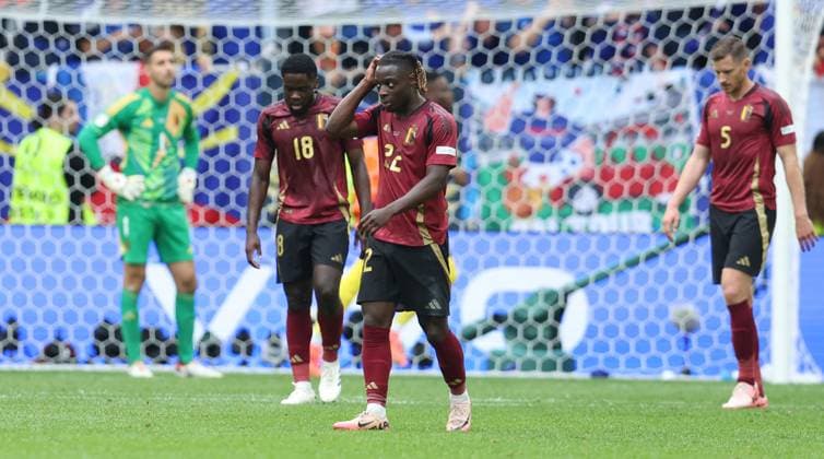 Dusseldorf, Germany, 1st July 2024. Jeremy Doku of Belgium (C), Orel Mangala of Belgium (L) and Jan Vertonghen of Belgium react after France score to lead 1-0 during the UEFA European Championships Round of 16 match at Dusseldorf Arena, Dusseldorf. Picture credit should read: Paul Terry Sportimage EDITORIAL USE ONLY. No use with unauthorised audio, video, data, fixture lists, club league logos or live services. Online in-match use limited to 120 images, no video emulation. No use in betting, games or single club league player publications. SPI-3216-0069