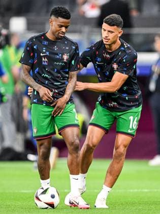FRANKFURT - (l-r) Nelson Semedo of Portugal, Matheus Nunes of Portugal during the UEFA EURO, EM, Europameisterschaft,Fussball 2024 round of 16 match between Portugal and Slovenia at the Frankfurt Arena on July 1, 2024 in Frankfurt, Germany. ANP Hollandse Hoogte UEFA EURO 2024 2024 xVIxANPxSportx xGerritxvanxKeulenxIVx 502555363 originalFilename: 502555363.jpg