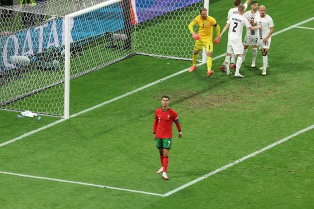 Cristiano Ronaldo of Portugal reacts to missing a penalty kick Portugal v Slovenia, UEFA European Championship, EM, Europameisterschaft 2024, Round of 16, Football, Frankfurt Arena, Frankfurt, Germany - 01 Jul 2024 EDITORIAL USE ONLY No use with unauthorised audio, video, data, fixture lists, club league logos or live services. Online in-match use limited to 120 images, no video emulation. No use in betting, games or single club league player publications. Copyright: xPaulxCurrie Shutterstockx 14566636cf