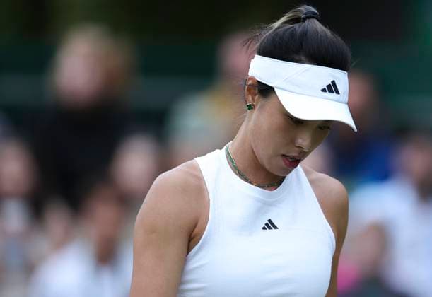(240702) -- LONDON, July 2, 2024 -- Wang Qiang reacts during the women s singles first round match between Wang Qiang of China and Emma Navarro of the United States at Wimbledon tennis Championship in London, Britain, on July 1, 2024. ) (SP)BRITAIN-LONDON-TENNIS-WIMBLEDON HanxYan 