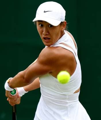 (240702) -- LONDON, July 2, 2024 -- Wang Xiyu hits a return during the women s singles first round match between Wang Xiyu of China and Donna Vekic of Croatia at Wimbledon tennis Championship in London, Britain, on July 1, 2024. ) (SP)BRITAIN-LONDON-TENNIS-WIMBLEDON LixYing 