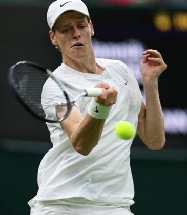 (240702) -- LONDON, July 2, 2024 -- Jannik Sinner hits a return during the men s singles first round match between Jannik Sinner of Italy and Yannick Hanfmann of Germany at Wimbledon tennis Championship in London, Britain, on July 1, 2024. ) (SP)BRITAIN-LONDON-TENNIS-WIMBLEDON HanxYan 