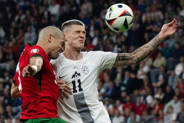 (240702) -- FRANKFURT, July 2, 2024 -- Pepe (L) of Portugal vies with Benjamin Sesko of Slovenia during the UEFA EURO, EM, Europameisterschaft,Fussball 2024 Round of 16 match between Portugal and Slovenia in Frankfurt, Germany on July 1, 2024. ) (SP)GERMANY-FRANKFURT-FOOTBALL-EURO 2024-PORTUGAL VS SLOVENIA XiaoxYijiu 