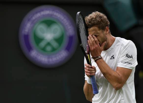 Sport Bilder des Tages (240702) -- LONDON, July 2, 2024 -- Yannick Hanfmann reacts during the men s singles first round match between Jannik Sinner of Italy and Yannick Hanfmann of Germany at Wimbledon tennis Championship in London, Britain, on July 1, 2024. ) (SP)BRITAIN-LONDON-TENNIS-WIMBLEDON HanxYan 