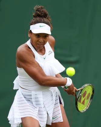 (240702) -- LONDON, July 2, 2024 -- Osaka Naomi hits a return during the women s singles first round match between Osaka Naomi of Japan and Diane Parry of France at Wimbledon tennis Championship in London, Britain, on July 1, 2024. ) (SP)BRITAIN-LONDON-TENNIS-WIMBLEDON HanxYan 