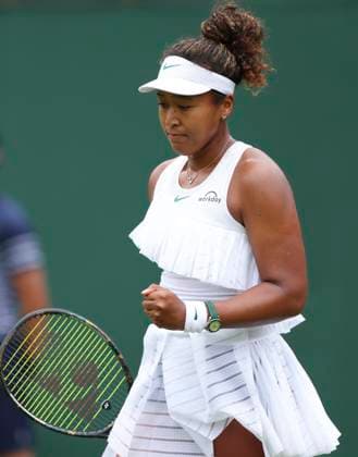 (240702) -- LONDON, July 2, 2024 -- Osaka Naomi reacts during the women s singles first round match between Osaka Naomi of Japan and Diane Parry of France at Wimbledon tennis Championship in London, Britain, on July 1, 2024. ) (SP)BRITAIN-LONDON-TENNIS-WIMBLEDON HanxYan 