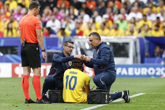 MUNCHEN, 02-07-2024, Stadium Allianz Arena, European Football Championship Euro2024, Round of 16 match no.40 between Romania and Netherlands. Romania player Ianis Hagi injured Romania - Netherlands (Euro2024)  x25660909x Copyright: