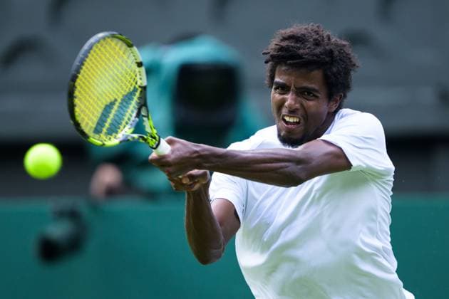 240702 And Elias Ymer of Sweden competes in a first round singles match during day 2 of Wimbledon on July 2, 2024 in London. Photo: Jesper Zerman BILDBYRAN kod JZ JZ0548 tennis wimbledon aeltc day 2 bbeng Copyright: JESPERxZERMAN BB240702JZ047