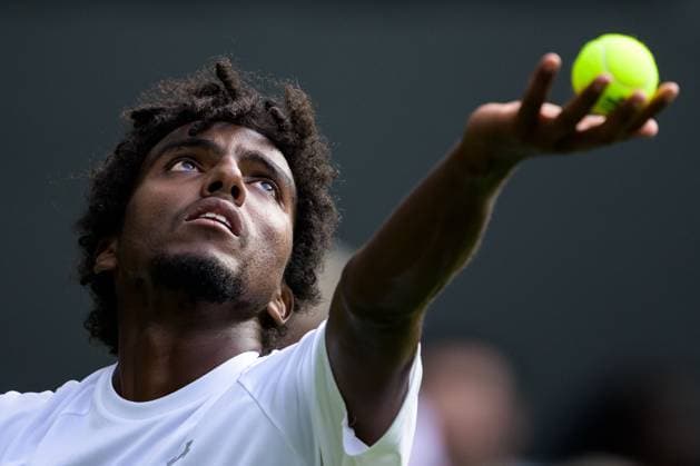 240702 Elias Ymer of Sweden competes in a first round singles match during day 2 of Wimbledon on July 2, 2024 in London. Photo: Jesper Zerman BILDBYRAN kod JZ JZ0548 tennis wimbledon aeltc day 2 bbeng Copyright: JESPERxZERMAN BB240702JZ051