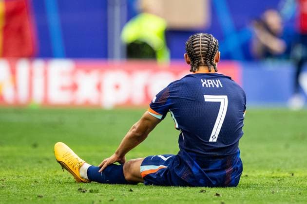 UEFA EURO, EM, Europameisterschaft,Fussball 2024: Rumänien - Niederlande; 02.07.2024 Xavi Simons (Niederlande, 7) mit den Emotionen, sitzt auf dem Rasen nach dem Shuss UEFA EURO 2024: Rumänien - Niederlande; Munich Football Arena, München; 02.07.2024 Copyright: xBEAUTIFULxSPORTS Buriakovx