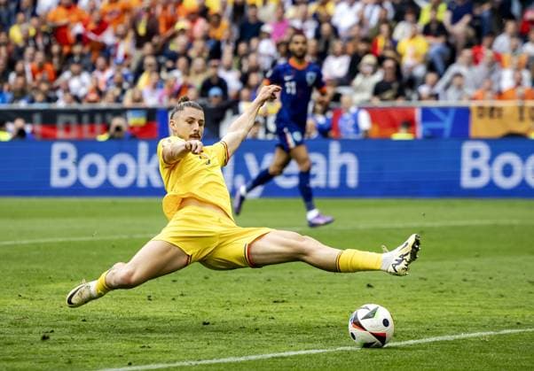 MUNICH - Radu Dragusin of Romania during the UEFA EURO, EM, Europameisterschaft,Fussball 2024 round of 16 match between Romania and Netherlands at the Munich Football Arena on July 2, 2024 in Munich, Germany. ANP KOEN VAN WEEL UEFA EURO 2024 2024 xVIxANPxSportx xxANPxIVx 502626468 originalFilename: 502626468.jpg