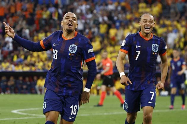 MUNCHEN, 02-07-2024, Stadium Allianz Arena, European Football Championship Euro2024, Round of 16 match no.40 between Romania and Netherlands. Netherlands player Donyell Malen celebrating his goal 0-3 , Netherlands player Xavi Simons Romania - Netherlands (Euro2024)  x25661988x Copyright: