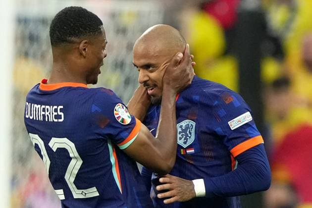 Donyell Malen of the Netherlands and Denzel Dumfries of the Netherlands .celebrate after scoring 0-3 during the Euro 2024 soccer match between Romania and Netherlands at the Munich Football Arena , Munich , Germany - Tuesday July 2 , 2024. - Soccer .  Copyright: xSpada LaPressex