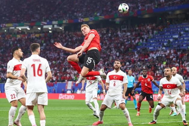 Austria v Turkey 2 July 2024, Leipzig - UEFA EUROs - Round of 16 - Austria v Turkey - Philipp Lienhart of Austria heads the ball over the bar - Photo: Charlotte Wilson Offside. Leipzig Germany Copyright: xCharlottexWilsonx xOffsidexOffside