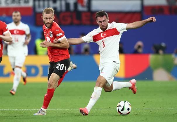 02.07.2024, xtgx, Fussball EM 2024 1 8 Finale, Österreich - Türkei emspor, v.l. Konrad Laimer (Oesterreich), Orkun Kökcü (Türkei Tuerkei) (UEFA REGULATIONS PROHIBIT ANY USE OF PHOTOGRAPHS as IMAGE SEQUENCES and or QUASI-VIDEO) Leipzig