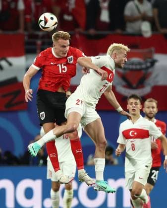 02.07.2024, xtgx, Fussball EM 2024 1 8 Finale, Österreich - Türkei emspor, v.l. Philipp Lienhart (Oesterreich), Baris Alper Yilmaz (Türkei Tuerkei) (UEFA REGULATIONS PROHIBIT ANY USE OF PHOTOGRAPHS as IMAGE SEQUENCES and or QUASI-VIDEO) Leipzig