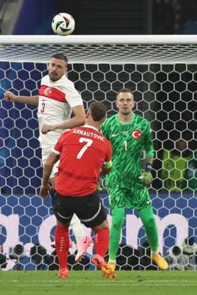 02.07.2024, xtgx, Fussball EM 2024 1 8 Finale, Österreich - Türkei emspor, v.l. Merih Demiral (Türkei Tuerkei), Marko Arnautovic (Oesterreich), Mert Günok (Türkei Tuerkei) (UEFA REGULATIONS PROHIBIT ANY USE OF PHOTOGRAPHS as IMAGE SEQUENCES and or QUASI-VIDEO) Leipzig
