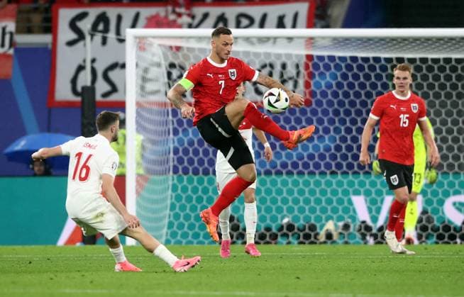 02.07.2024, xtgx, Fussball EM 2024 1 8 Finale, Österreich - Türkei emspor, v.l. Ismail Yüksek (Türkei Tuerkei), Marko Arnautovic (Oesterreich) (UEFA REGULATIONS PROHIBIT ANY USE OF PHOTOGRAPHS as IMAGE SEQUENCES and or QUASI-VIDEO) Leipzig
