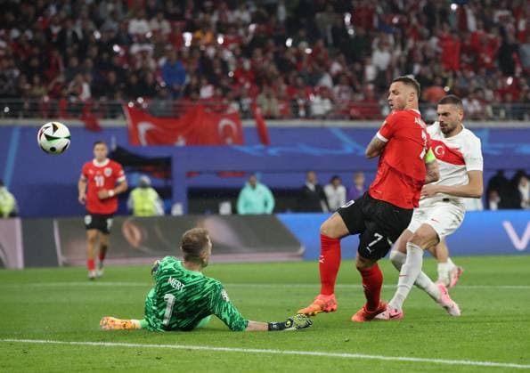02.07.2024, xtgx, Fussball EM 2024 1 8 Finale, Österreich - Türkei emspor, v.l. Mert Günok (Türkei Tuerkei), Marko Arnautovic (Oesterreich), Merih Demiral (Türkei Tuerkei) (UEFA REGULATIONS PROHIBIT ANY USE OF PHOTOGRAPHS as IMAGE SEQUENCES and or QUASI-VIDEO) Leipzig