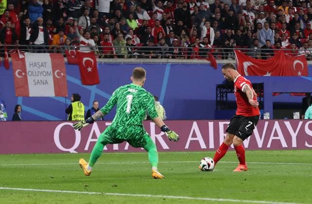 02.07.2024, xtgx, Fussball EM 2024 1 8 Finale, Österreich - Türkei emspor, v.l. Mert Günok (Türkei Tuerkei), Marko Arnautovic (Oesterreich) (UEFA REGULATIONS PROHIBIT ANY USE OF PHOTOGRAPHS as IMAGE SEQUENCES and or QUASI-VIDEO) Leipzig