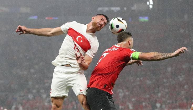 Sport Bilder des Tages 02.07.2024, xtgx, Fussball EM 2024 1 8 Finale, Österreich - Türkei emspor, v.l. Salih Özcan (Türkei Tuerkei), Marko Arnautovic (Oesterreich) (UEFA REGULATIONS PROHIBIT ANY USE OF PHOTOGRAPHS as IMAGE SEQUENCES and or QUASI-VIDEO) Leipzig
