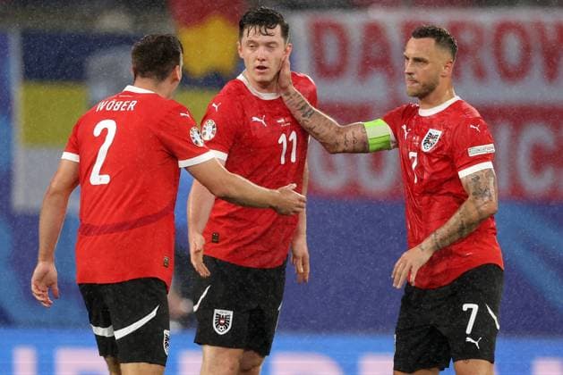 Leipzig, Germany, 2nd July 2024. Michael Gregoritsch of Austria (C) celebrates after scoring his teams opening goal during the UEFA European Championships Round of 16 match at Leipzig Stadium, Leipzig. Picture credit should read: Paul Terry Sportimage EDITORIAL USE ONLY. No use with unauthorised audio, video, data, fixture lists, club league logos or live services. Online in-match use limited to 120 images, no video emulation. No use in betting, games or single club league player publications. SPI-3215-0064