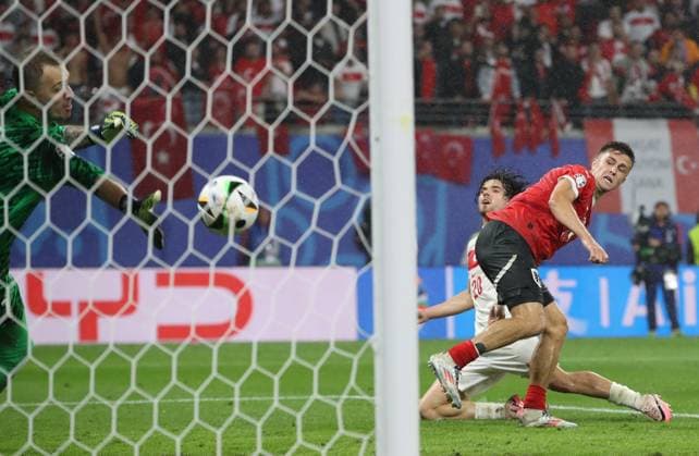 02.07.2024, xtgx, Fussball EM 2024 1 8 Finale, Österreich - Türkei emspor, v.l. Mert Günok (Türkei Tuerkei), Christoph Baumgartner (Oesterreich), Ferdi Erenay Kadioglu (Türkei Tuerkei) (UEFA REGULATIONS PROHIBIT ANY USE OF PHOTOGRAPHS as IMAGE SEQUENCES and or QUASI-VIDEO) Leipzig