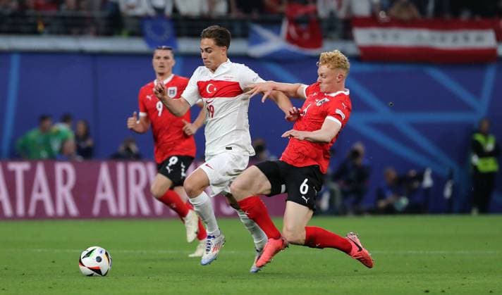 Kenan Yildiz im Zweikampf mit Nicolas Seiwald Spielszene Aktion Fußball Fussball Europameisterschaft Euro 2024 EM Herren Saison 2023 2024 02.07.2024 Österreich AUT vs. Türkei TUR in Leipzig DFL regulations prohibit any use of photographs as image sequences and or quasi-video.