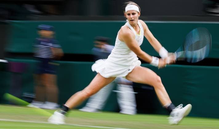 Belgian Minnen pictured in action during a tennis match against Italian Paolini, in the second round of the women s singles competition of the 2024 Wimbledon grand slam tournament at the All England Tennis Club, in south-west London, Britain, Wednesday 03 July 2024. BENOITxDOPPAGNE  x95788517x