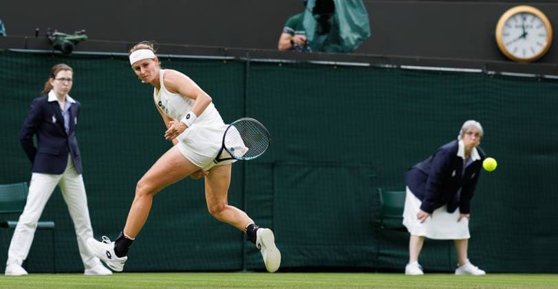 Belgian Minnen pictured in action during a tennis match against Italian Paolini, in the second round of the women s singles competition of the 2024 Wimbledon grand slam tournament at the All England Tennis Club, in south-west London, Britain, Wednesday 03 July 2024. BENOITxDOPPAGNE  x95788525x