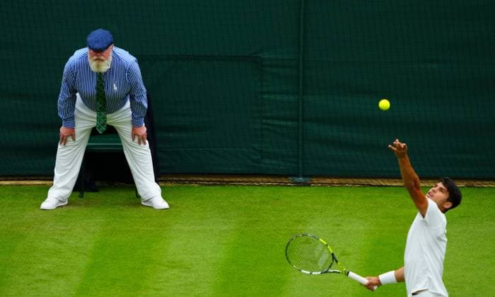 A line-judge looks on as Carlos Alcaraz serves Wimbledon Tennis Championships, Day 3, The All England Lawn Tennis and Croquet Club, London, UK - 03 Jul 2024  Copyright: xJavierxGarcia Shutterstockx 14568269jc