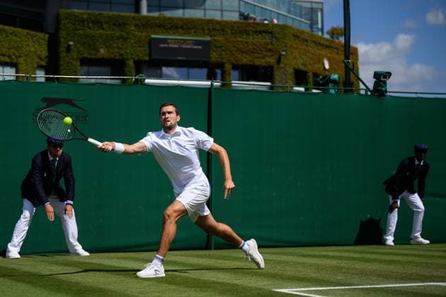 240704 William Blumberg of USA compete in a first round doubles match during day 4 of Wimbledon on July 4, 2024 in London. Photo: Jesper Zerman BILDBYRAN kod JZ JZ0550 tennis wimbledon dag 4 bbeng Copyright: JESPERxZERMAN BB240704JZ002