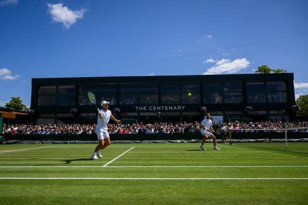 240704 Casper Ruud of Norway and William Blumberg of USA compete in a first round doubles match during day 4 of Wimbledon on July 4, 2024 in London. Photo: Jesper Zerman BILDBYRAN kod JZ JZ0550 tennis wimbledon dag 4 bbeng Copyright: JESPERxZERMAN BB240704JZ019