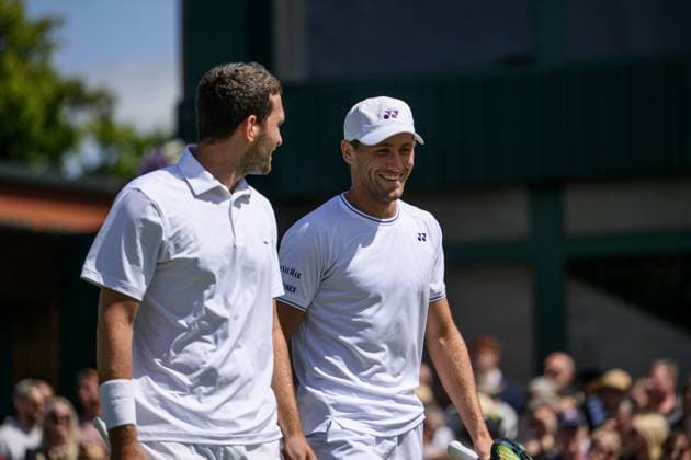 240704 Casper Ruud of Norway and William Blumberg of USA compete in a first round doubles match during day 4 of Wimbledon on July 4, 2024 in London. Photo: Jesper Zerman BILDBYRAN kod JZ JZ0550 tennis wimbledon dag 4 bbeng Copyright: JESPERxZERMAN BB240704JZ023