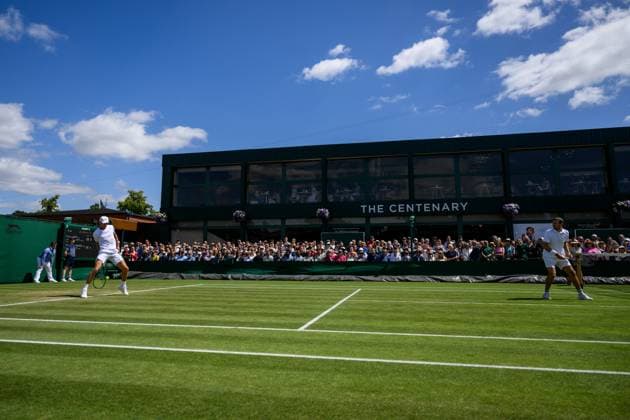 240704 Casper Ruud of Norway and Joe Salisbury of Great Britain compete in a first round doubles match during day 4 of Wimbledon on July 4, 2024 in London. Photo: Jesper Zerman BILDBYRAN kod JZ JZ0550 tennis wimbledon dag 4 bbeng Copyright: JESPERxZERMAN BB240704JZ027