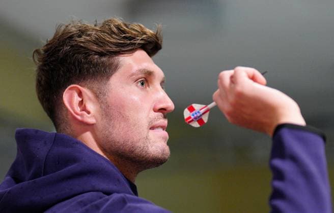 John Stones of England wins his darts match against the media England press conference, PK, Pressekonferenz UEFA European Championship, EM, Europameisterschaft 2024, Quarter Final, Football, Spa & Golf Resort Weimarer Land, Blankenhain, Germany, 04 Jul 2024 EDITORIAL USE ONLY No use with unauthorised audio, video, data, fixture lists, club league logos or live services. Online in-match use limited to 120 images, no video emulation. No use in betting, games or single club league player publications. Copyright: xDavexShopland Shutterstockx 14568238n