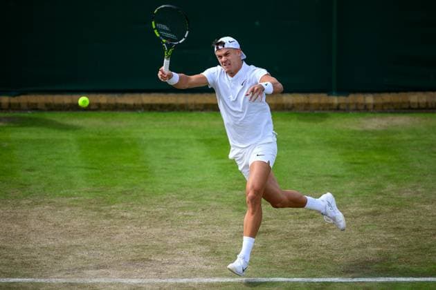 240704 Holger Rune of Denmark competes in a second round singles match during day 4 of Wimbledon on July 4, 2024 in London. Photo: Jesper Zerman BILDBYRAN kod JZ JZ0550 tennis wimbledon dag 4 bbeng Copyright: JESPERxZERMAN BB240704JZ069