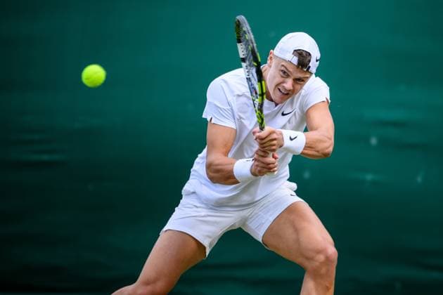 240704 Holger Rune of Denmark competes in a second round singles match during day 4 of Wimbledon on July 4, 2024 in London. Photo: Jesper Zerman BILDBYRAN kod JZ JZ0550 tennis wimbledon dag 4 bbeng Copyright: JESPERxZERMAN BB240704JZ101