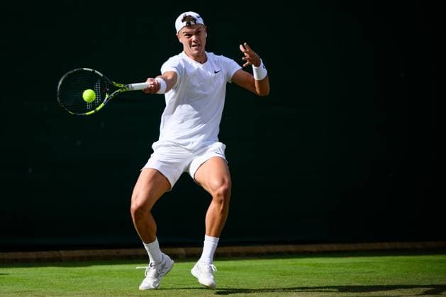 240704 Holger Rune of Denmark competes in a second round singles match during day 4 of Wimbledon on July 4, 2024 in London. Photo: Jesper Zerman BILDBYRAN kod JZ JZ0550 tennis wimbledon dag 4 bbeng Copyright: JESPERxZERMAN BB240704JZ106