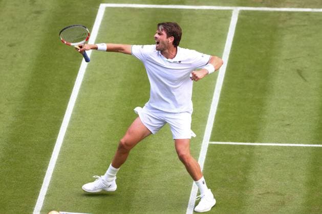 4th July 2024; All England Lawn Tennis and Croquet Club, London, England; Wimbledon Tennis Tournament, Day 4; Cameron Norrie (GBR) celebrates as he wins the first set during his second round match against Jack Draper (GBR)  ActionPlus12663748 ShaunxBrooks