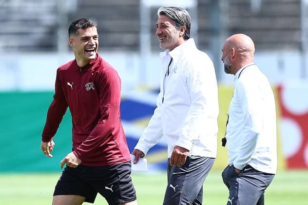 EURO 2024, Nationalteam Schweiz Training Granit Xhaka of Switzerland jokes with Switzerland manager Murat Yakin Switzerland Training, UEFA European Championship, EM, Europameisterschaft 2024, Quarter Final, Football, Stadion auf der Waldau, Stuttgart, Germany, 05 Jul 2024 EDITORIAL USE ONLY No use with unauthorised audio, video, data, fixture lists, club league logos or live services. Online in-match use limited to 120 images, no video emulation. No use in betting, games or single club league player publications.  Copyright: xMichaelxZemanek Shutterstockx 14571352k