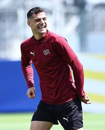 EURO 2024, Nationalteam Schweiz Training Granit Xhaka of Switzerland jokes with Switzerland manager Murat Yakin Switzerland Training, UEFA European Championship, EM, Europameisterschaft 2024, Quarter Final, Football, Stadion auf der Waldau, Stuttgart, Germany, 05 Jul 2024 EDITORIAL USE ONLY No use with unauthorised audio, video, data, fixture lists, club league logos or live services. Online in-match use limited to 120 images, no video emulation. No use in betting, games or single club league player publications.  Copyright: xMichaelxZemanek Shutterstockx 14571352i
