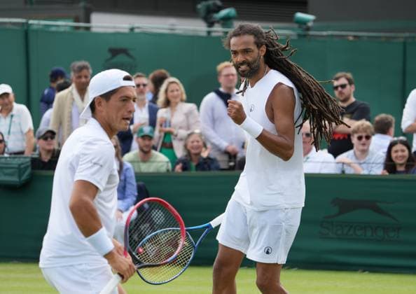 Lawn Tennis - 2024 Wimbledon Championship Mens Doubles Sebastian Baez (ARG) and Dustin Brown (JAM) vHugo Nys (MON) and Zeilinski (POL) - All England Lawn Tennis & Croquet Club - Friday 5th July 2024 Dustin Brown (JAM) and Sebastian Baez (ARG) celebrate winning the 2nd set 