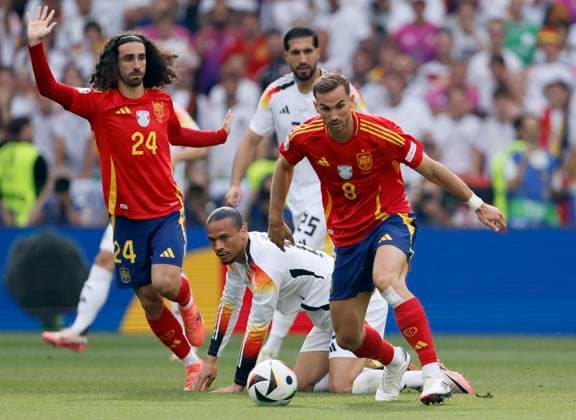 Spain v Germany: Quarter-Final - UEFA EURO, EM, Europameisterschaft,Fussball 2024 Leroy Sane of Germany and Fabian Ruiz of Spain challenge during the UEFA EURO 2024 quarter-final match between Spain and Germany at Stuttgart Arena on July 5, 2024 in Stuttgart, Germany. Stuttgart Stuttgart Arena Germany Germany Copyright: xRichardxSellers Sportsphoto APLx 14044140