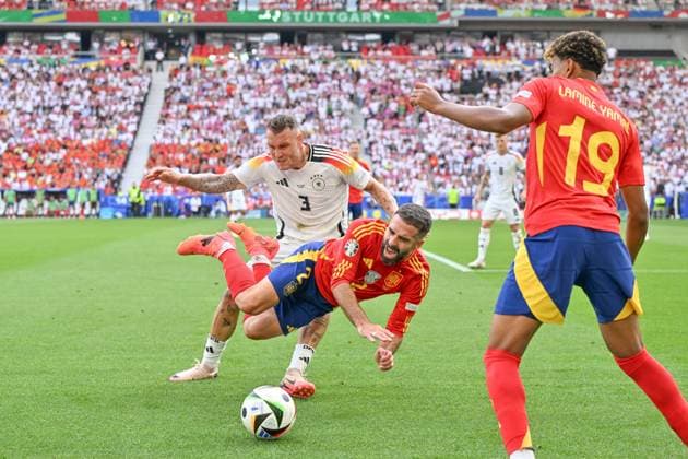 240705 EURO2024 SPAIN VS GERMANY David Raum (3) of Germany fouls Dani Carvajal (2) of Spain during a soccer game between the national teams of Spain and Germany in the Quarter Final stage of the UEFA EURO, EM, Europameisterschaft,Fussball 2024 tournament , on Friday 5 July 2024 in Stuttgart , Germany . PHOTO SPORTPIX David Catry STUTTGART GERMANY  Copyright: xx 472043