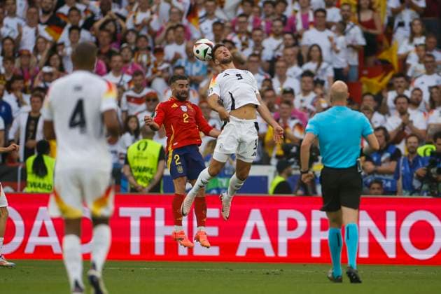 Spain s Dani Carvajal (C-L) in action against Germany s Niclas Fuellkrug (C-R) during the UEFA EURO, EM, Europameisterschaft,Fussball 2024 s quarter-finals game between Spain and Germany at MHPArena stadium in Stuttgart, Germany, 05 July 2024. Spain vs. Germany !ACHTUNG: NUR REDAKTIONELLE NUTZUNG!  Copyright: xAlbertoxEstevezx GRAF2312 20240705-55014071883_1