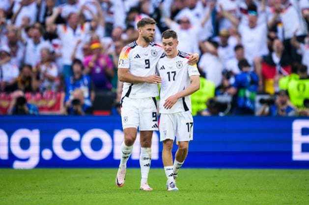 240705 Niclas Fullkrug and Florian Wirtz, celebrate after the 1-1 goal during the UEFA EURO, EM, Europameisterschaft,Fussball 2024 Football Championship quarterfinal between Spain and Germany on July 5, 2024 in Stuttgart. Photo: Mathias Bergeld BILDBYRAN kod MB MB0942 fotboll football soccer fotball fotbolls-em europamästerskap em uefa euro uefa european football championship euro 2024 kvartsfinal quarterfinal quarterfinals spanien spain tyskland germany bbeng bbauto jubel Copyright: MATHIASxBERGELD BB240705MB068