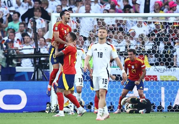 Mikel Merino of Spain and Joselu of Spain celebrate winning the game at full time Spain v Germany, UEFA European Championship, EM, Europameisterschaft 2024, Quarter Final, Football, Stuttgart Arena, Stuttgart, Germany, 05 Jul 2024 EDITORIAL USE ONLY No use with unauthorised audio, video, data, fixture lists, club league logos or live services. Online in-match use limited to 120 images, no video emulation. No use in betting, games or single club league player publications. Copyright: xMichaelxZemanek Shutterstockx 14571380dh