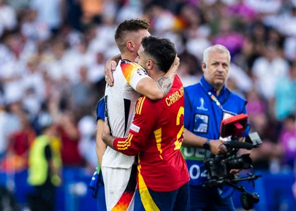 Stuttgart, MHPArena 05.07.2024: Daniel Carvajal of spain comforts Toni Kroos of germany during the quarterfinal match Spain v. Germany at the UEFA European Championship, EM, Europameisterschaft 2024.