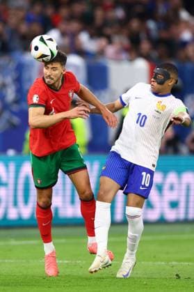 Ruben Dias of Portugal and Kylian Mbappà of France Portugal v France, UEFA European Championship, EM, Europameisterschaft 2024, Quarter Final, Football, Volksparkstadion, Hamburg, Germany, 05 Jul 2024 EDITORIAL USE ONLY No use with unauthorised audio, video, data, fixture lists, club league logos or live services. Online in-match use limited to 120 images, no video emulation. No use in betting, games or single club league player publications. Copyright: xKieranxMcManus Shutterstockx 14571382au